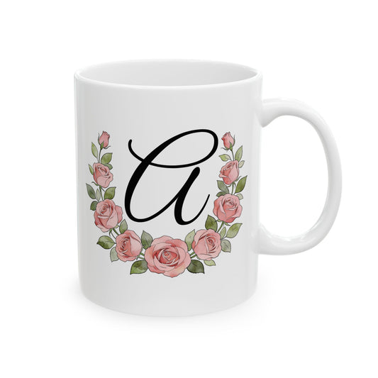 White mug with floral rose design and letter 'A' on a white background