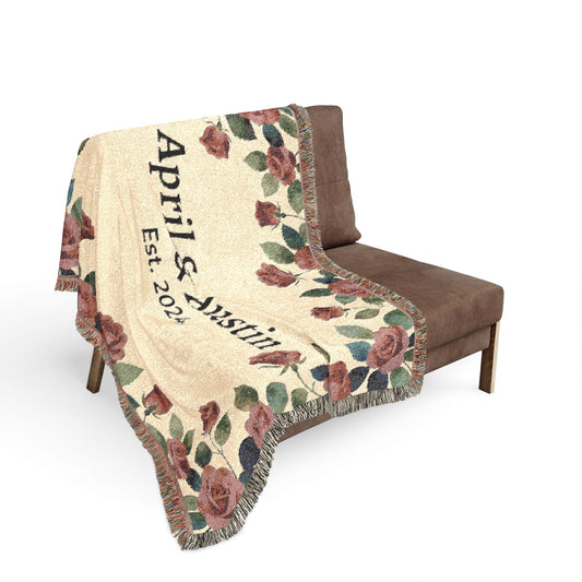 Personalized couples blanket draped over a chair as cozy bedroom decor with custom names