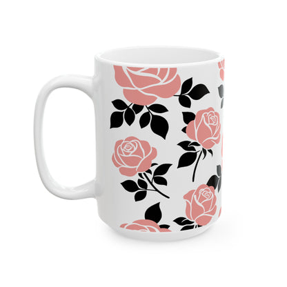 White mug with pink and black floral pattern on a white background